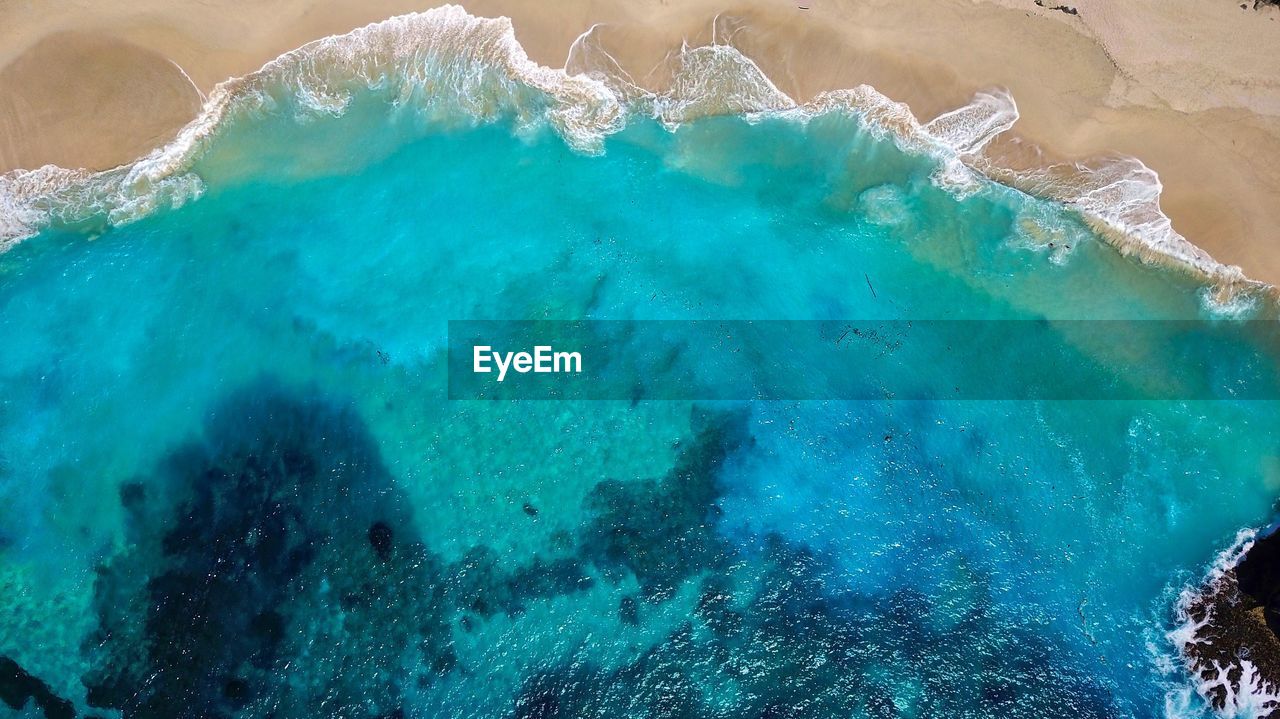 High angle view of rocks on beach