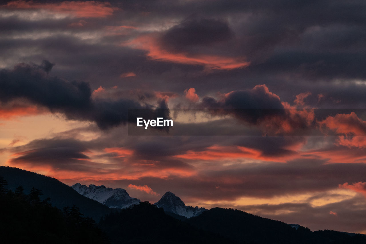 Scenic view of dramatic sky during sunset