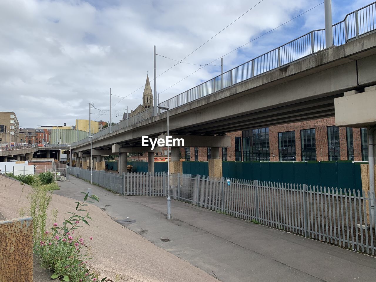 VIEW OF RAILROAD STATION AGAINST SKY