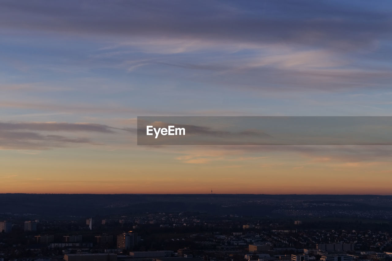 High angle view of townscape against sky during sunset