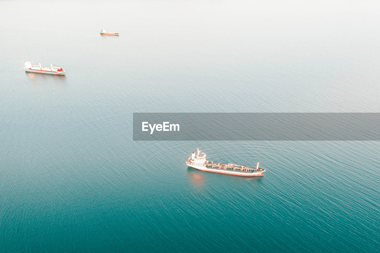 High angle view of sailboat sailing on sea