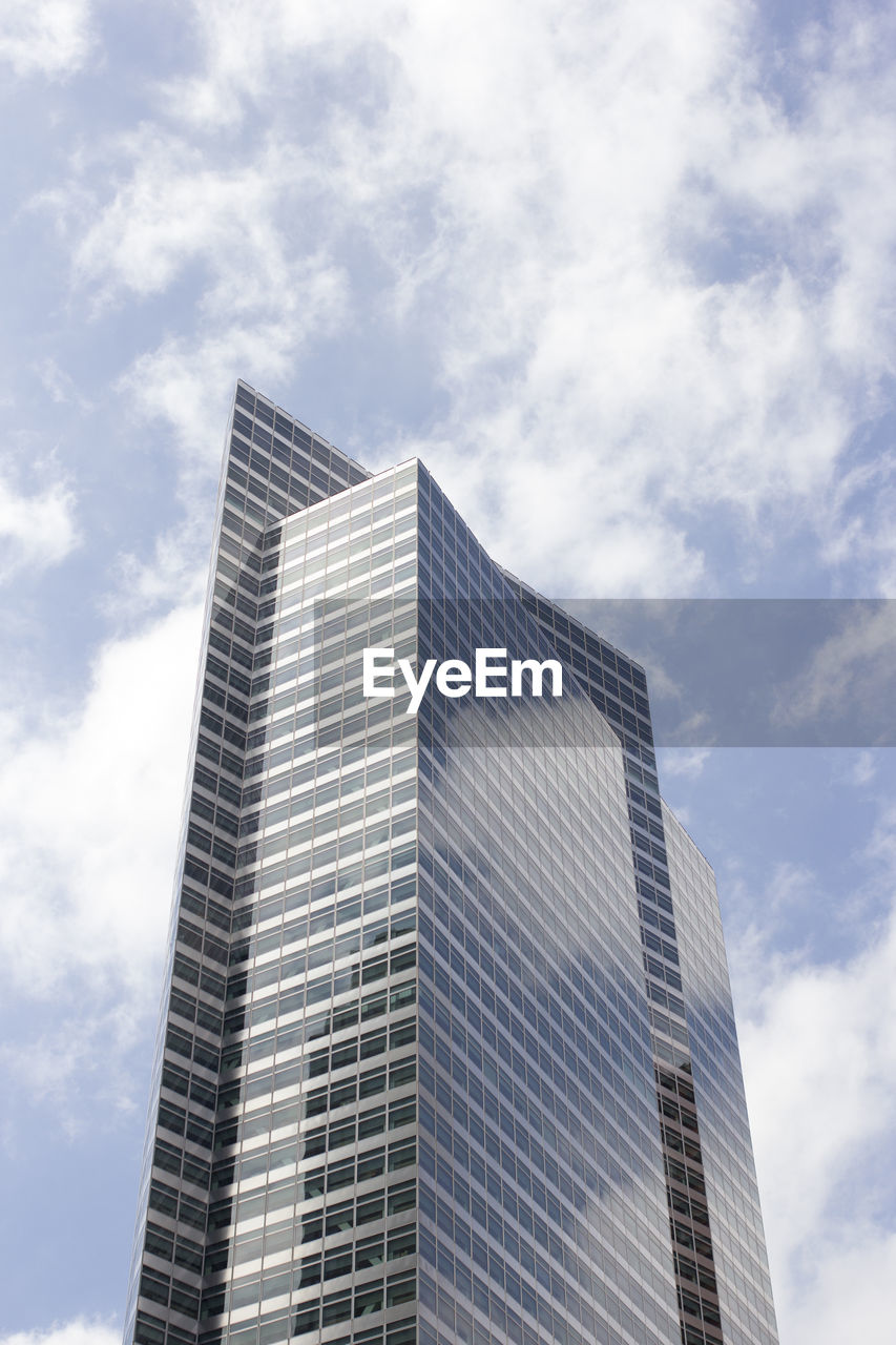 Low angle view of modern buildings against sky