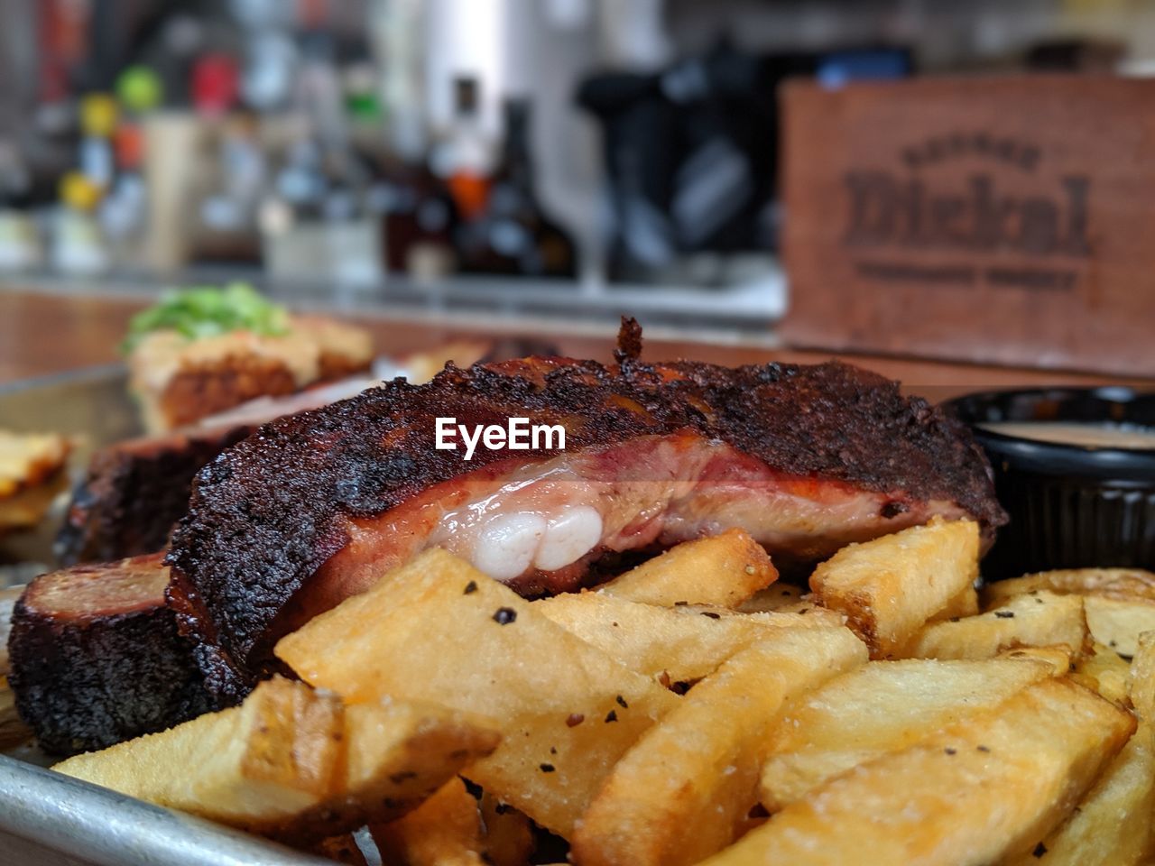 CLOSE-UP OF MEAT IN TRAY