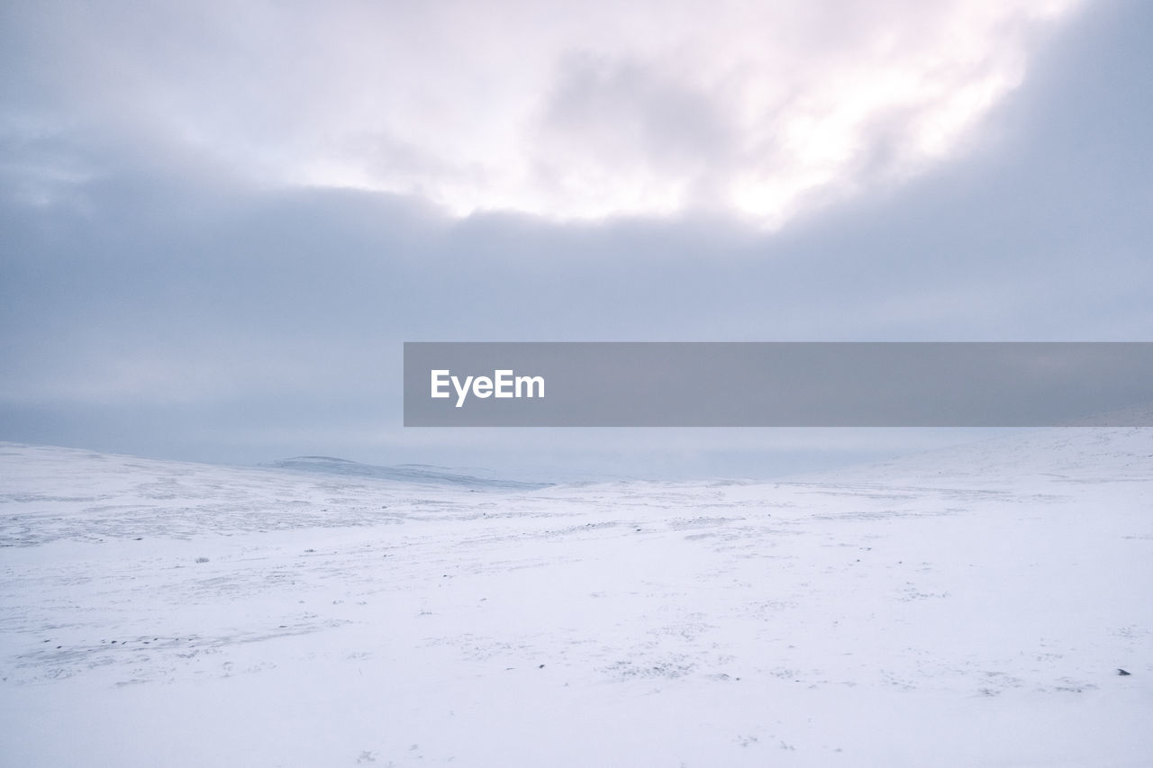 Scenic view of snow covered landscape