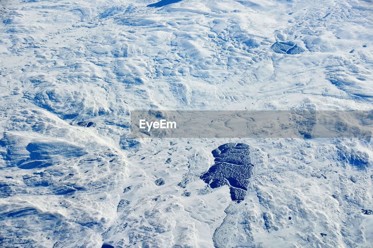 Aerial view of snow covered landscape