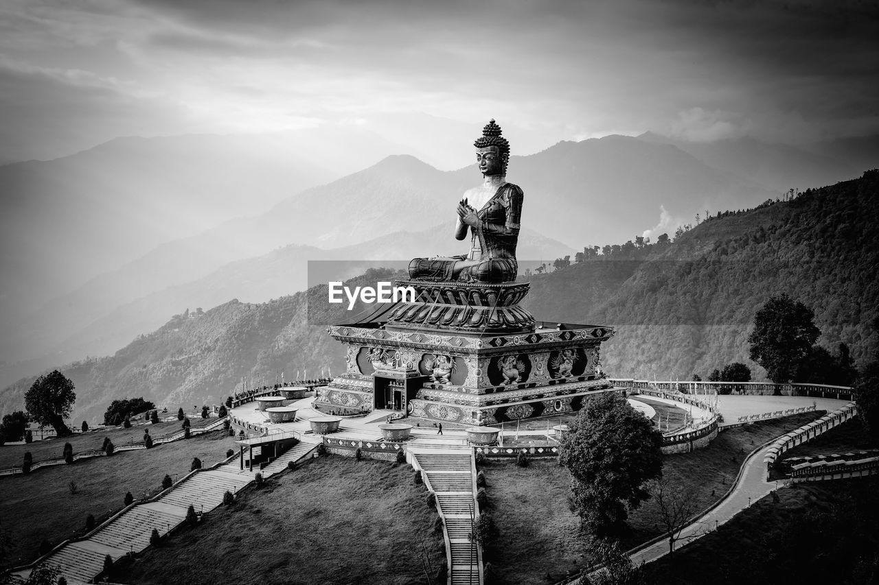 Buddha park of ravangla against cloudy sky