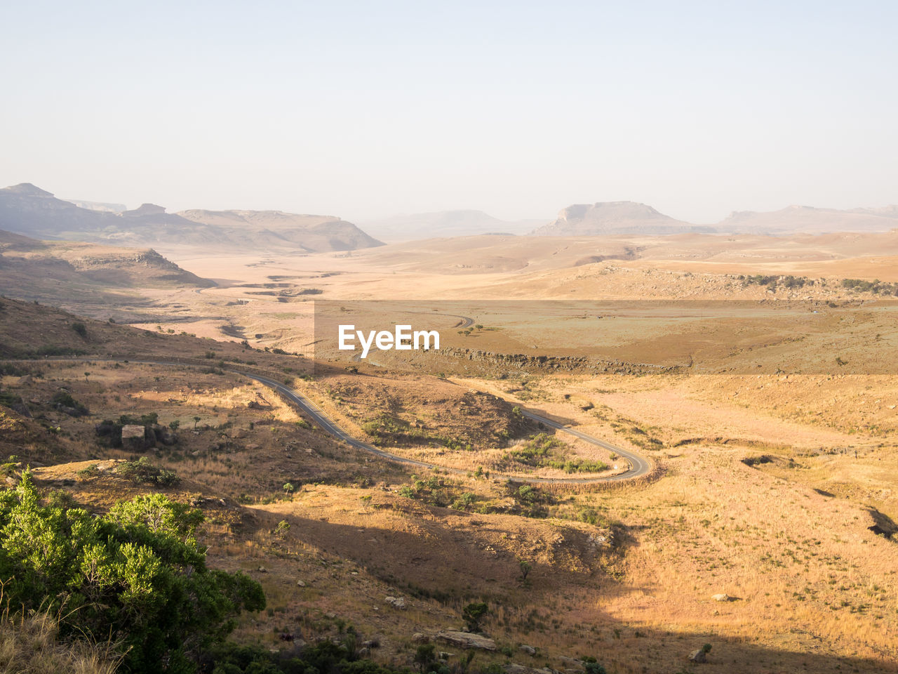 Scenic view of desert against clear sky