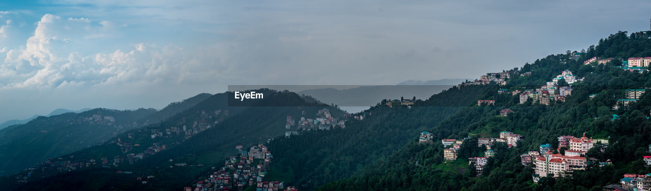 High angle view of buildings in city against sky