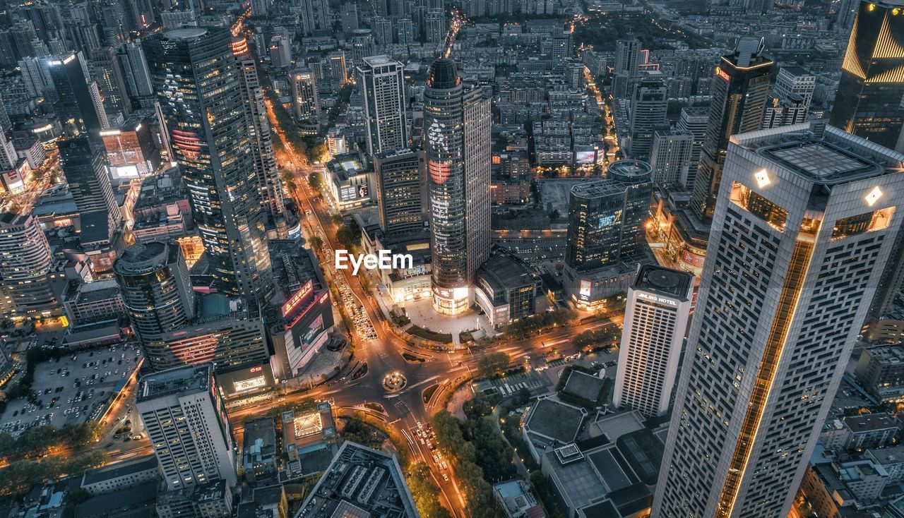 High angle view of illuminated cityscape at night