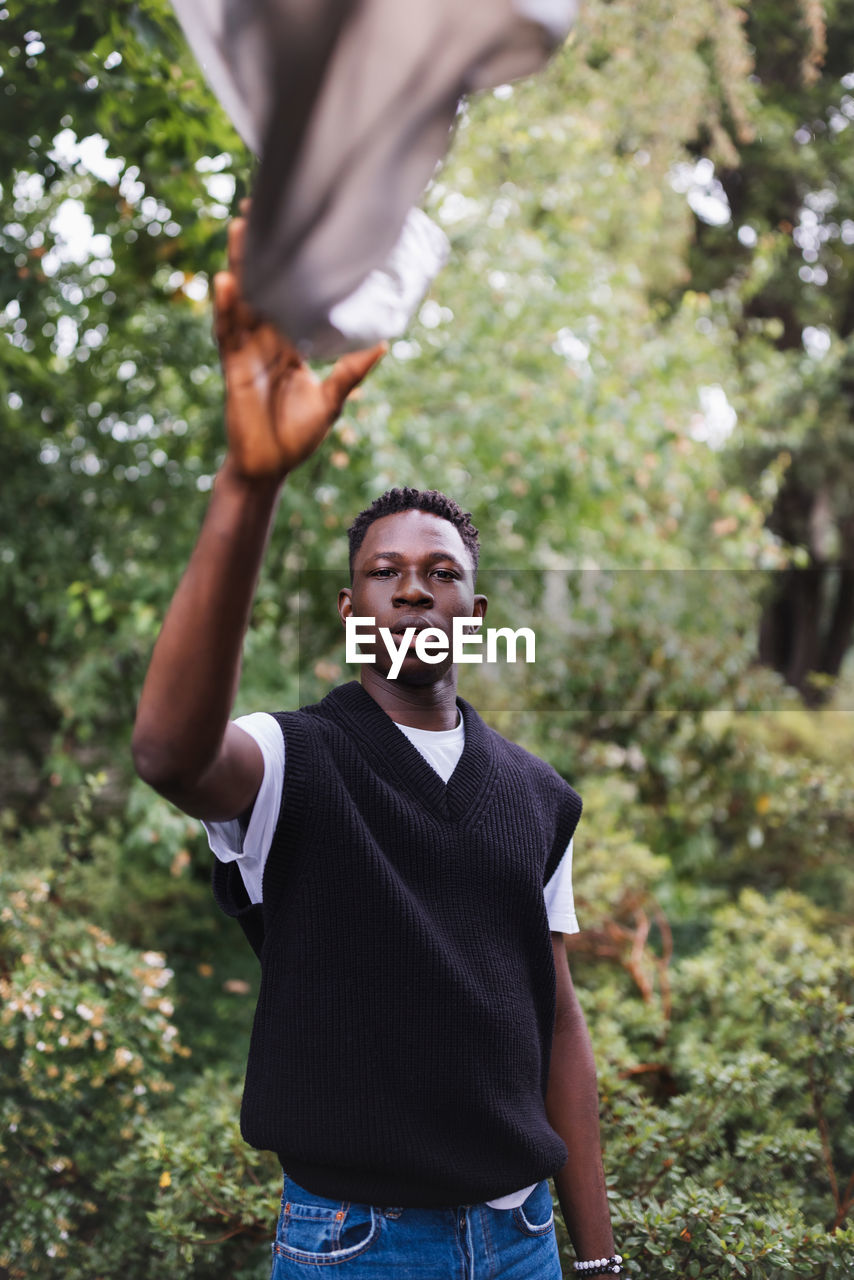 Young african man portrait. plastic pollution, ecology concept