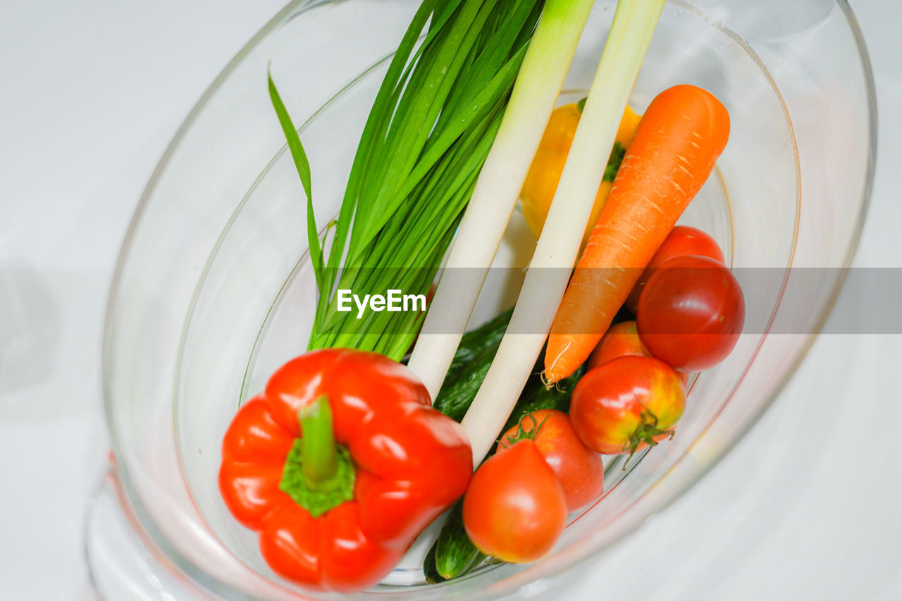 high angle view of bell peppers in plate on table