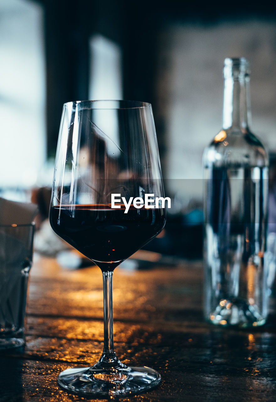 Close-up of wineglass on table