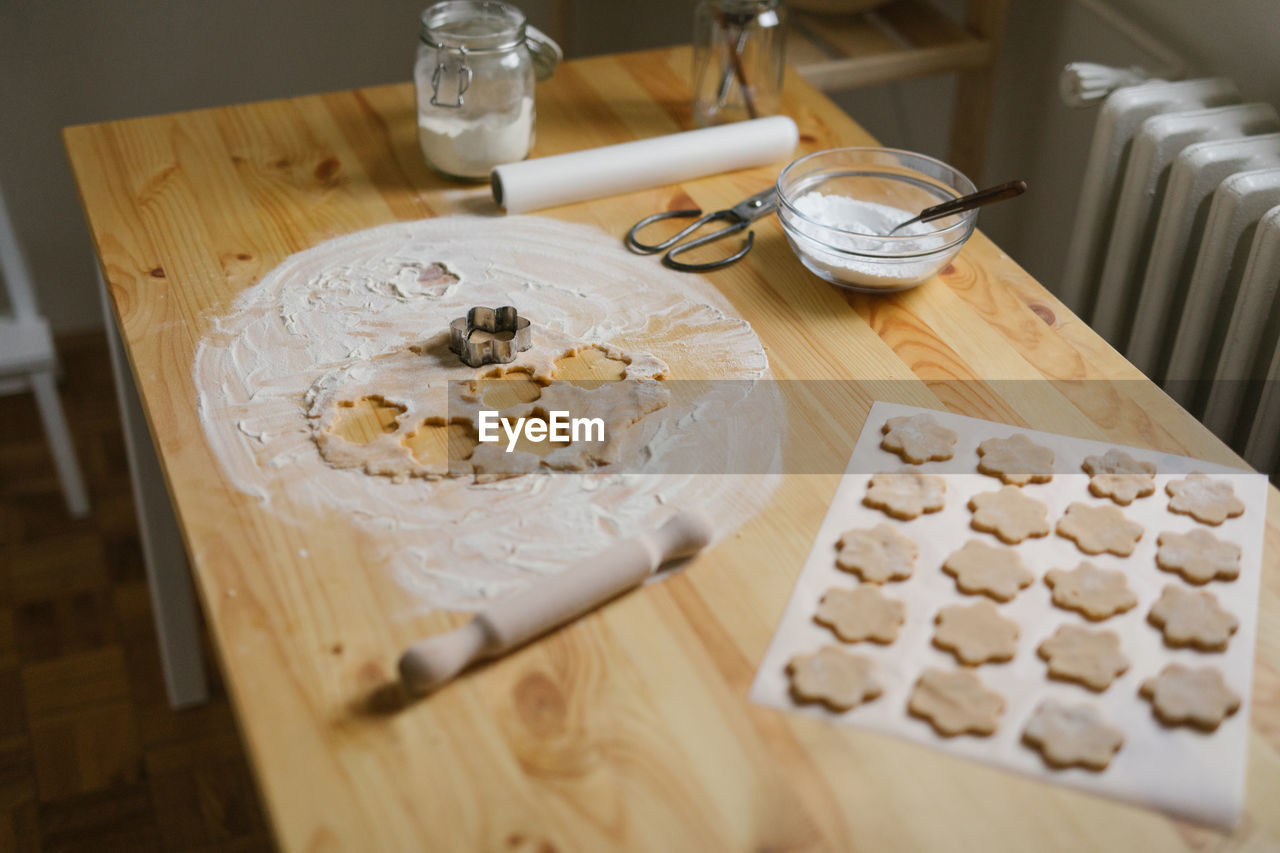 Young woman making christmas cookies