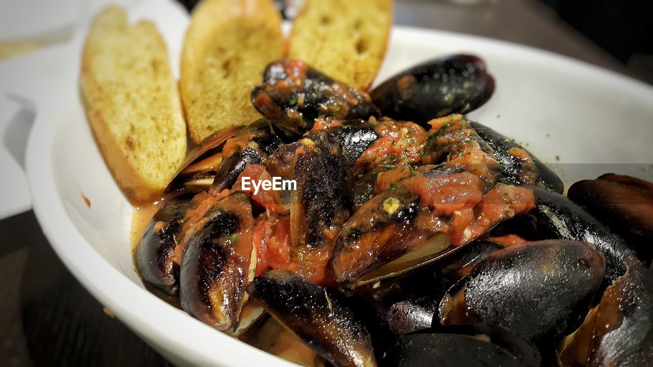 High angle view of mussels in bowl