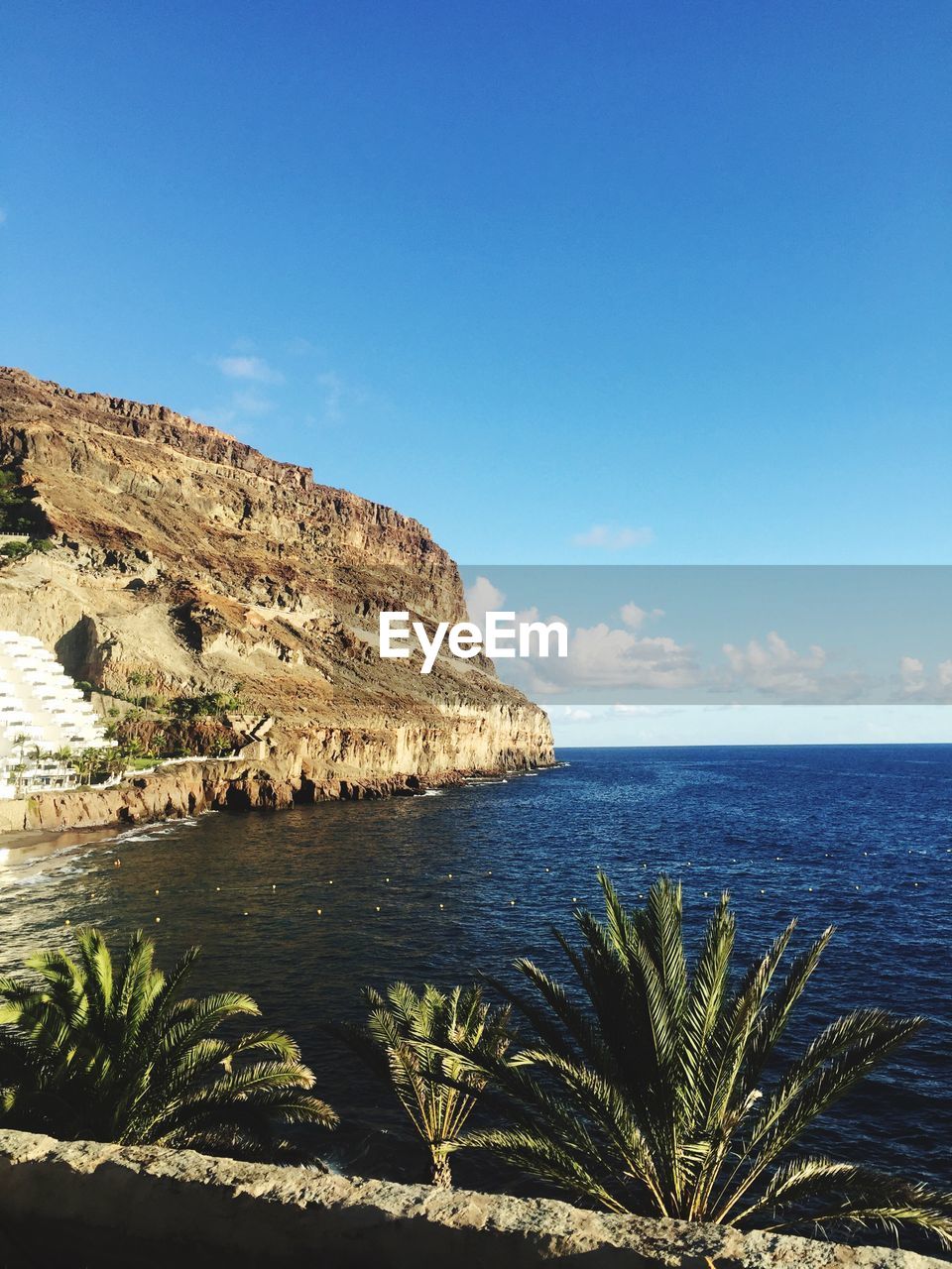 SCENIC VIEW OF SEA AGAINST BLUE SKY
