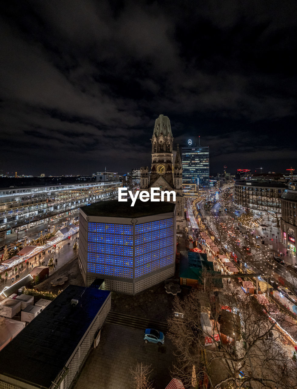 high angle view of illuminated buildings in city