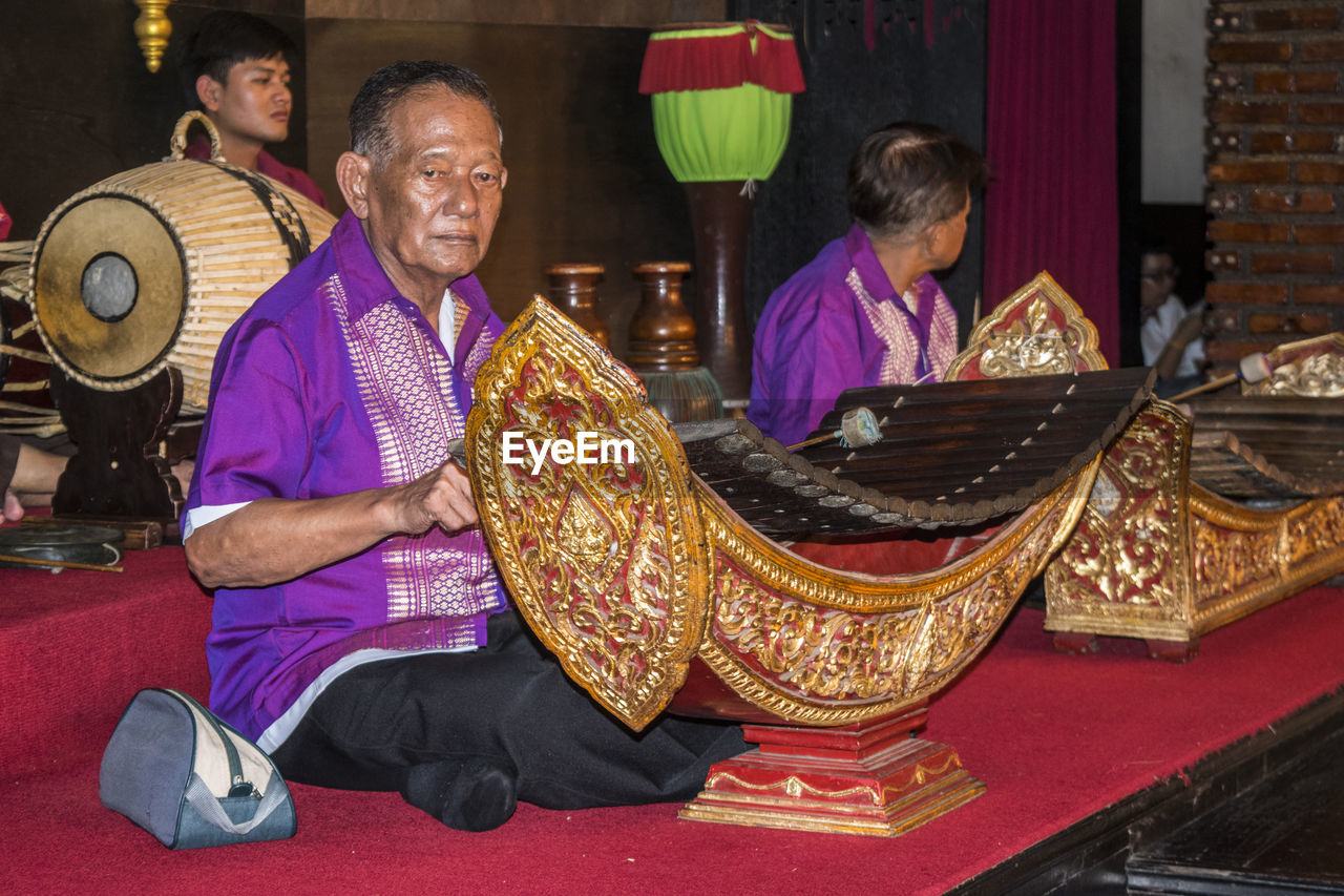 FULL FRAME SHOT OF MASK WITH TRADITIONAL CLOTHING