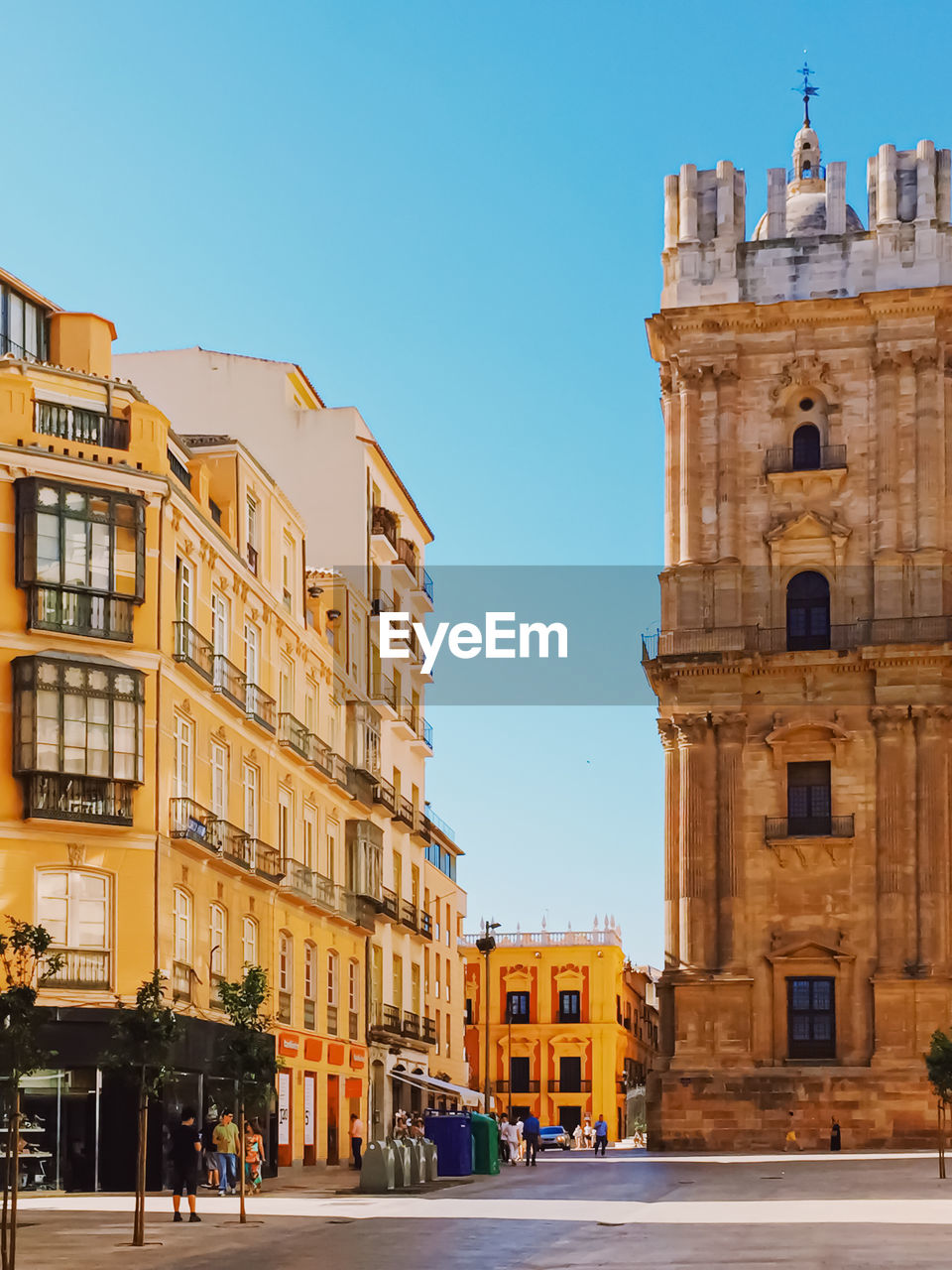 view of buildings in city against clear sky