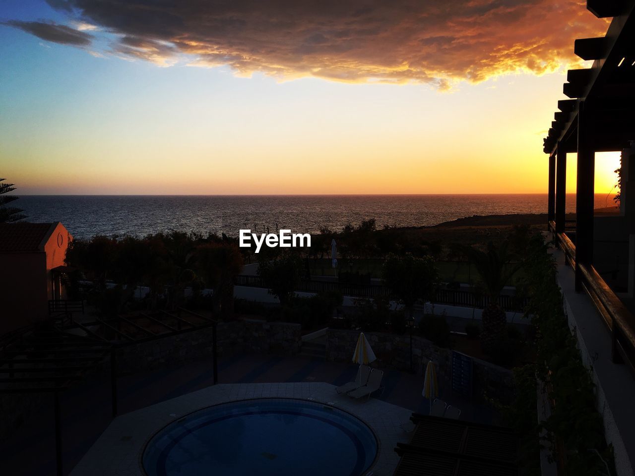 VIEW OF SEA AT SUNSET