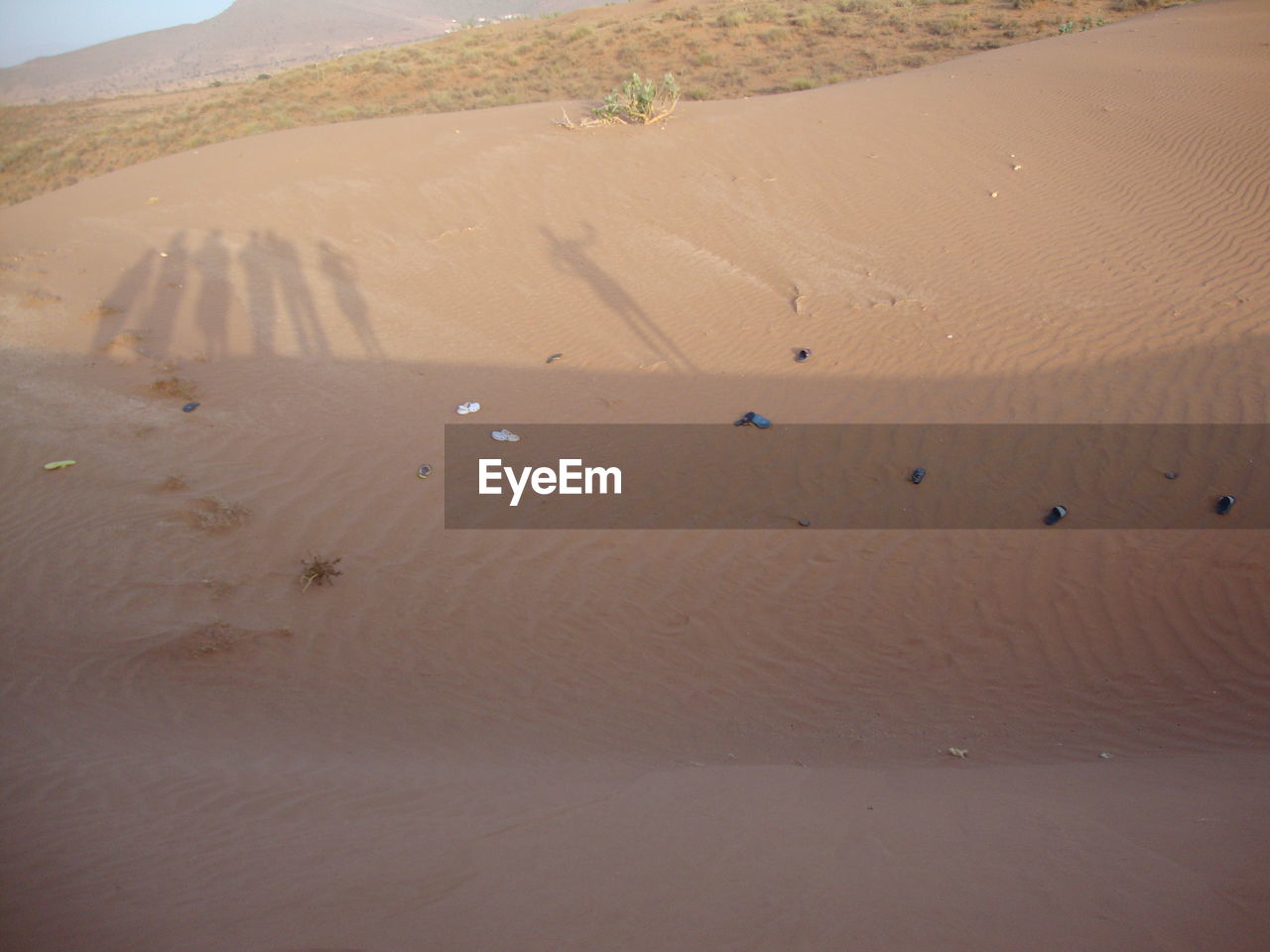 HIGH ANGLE VIEW OF SAND DUNES ON DESERT