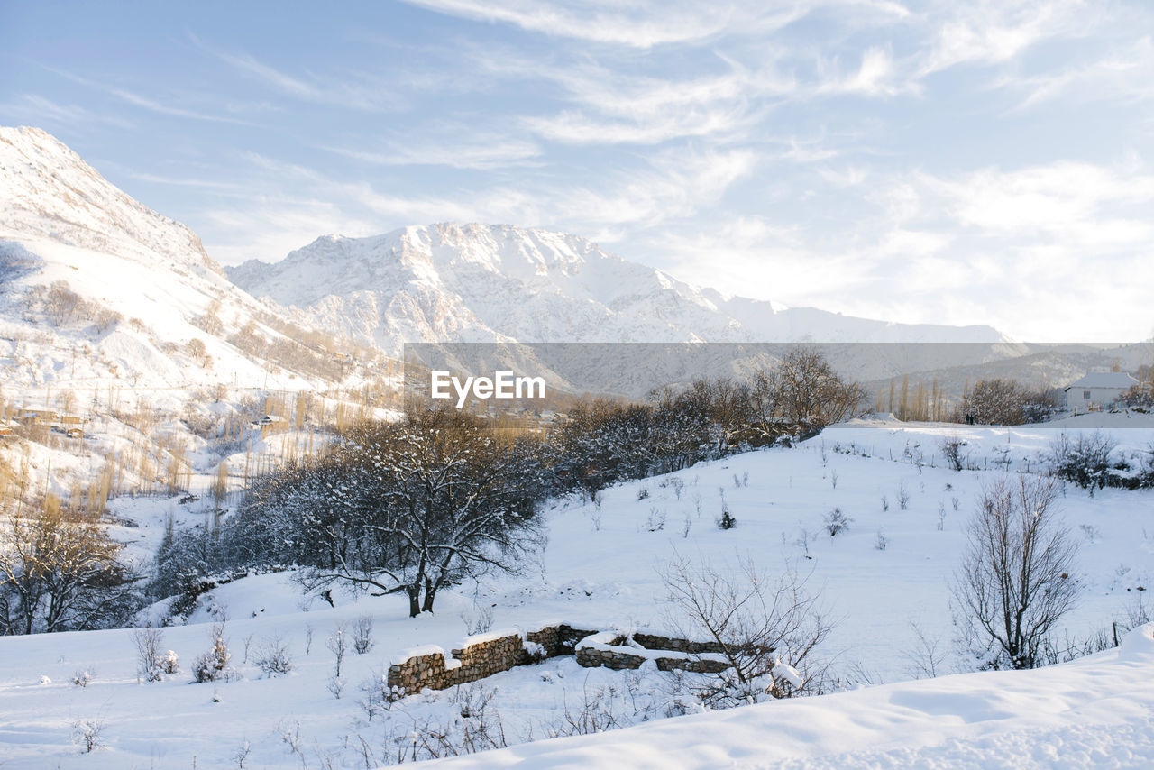 Winter beautiful mountain landscape of the tianshan mountain system in uzbekistan on a clear 