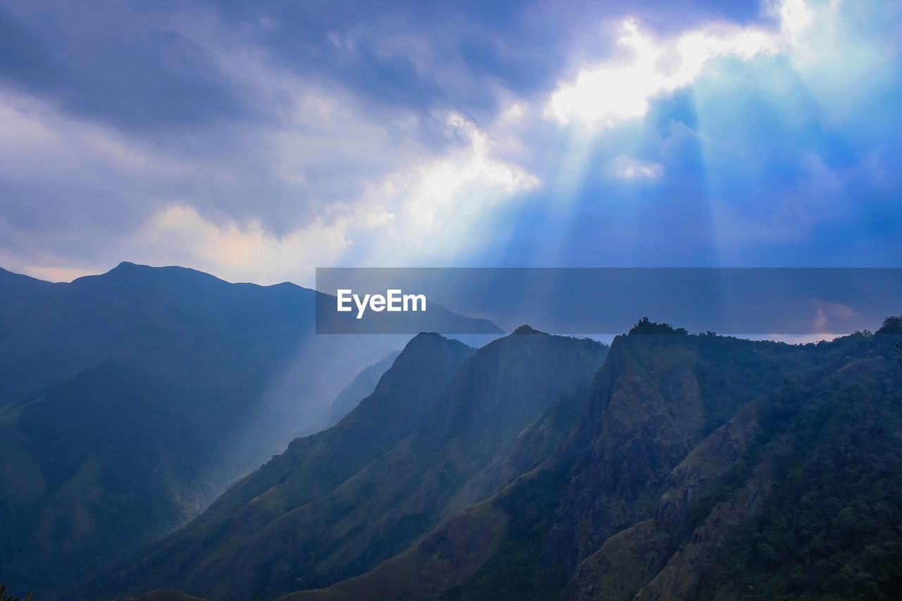 Panoramic view of mountains against sky