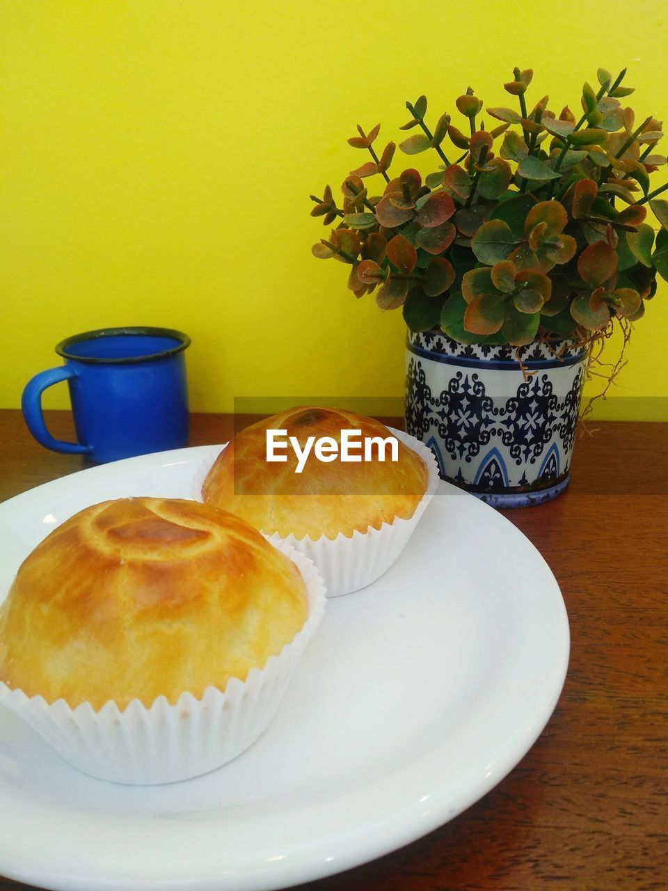 CLOSE-UP OF BREAKFAST SERVED WITH COFFEE ON TABLE