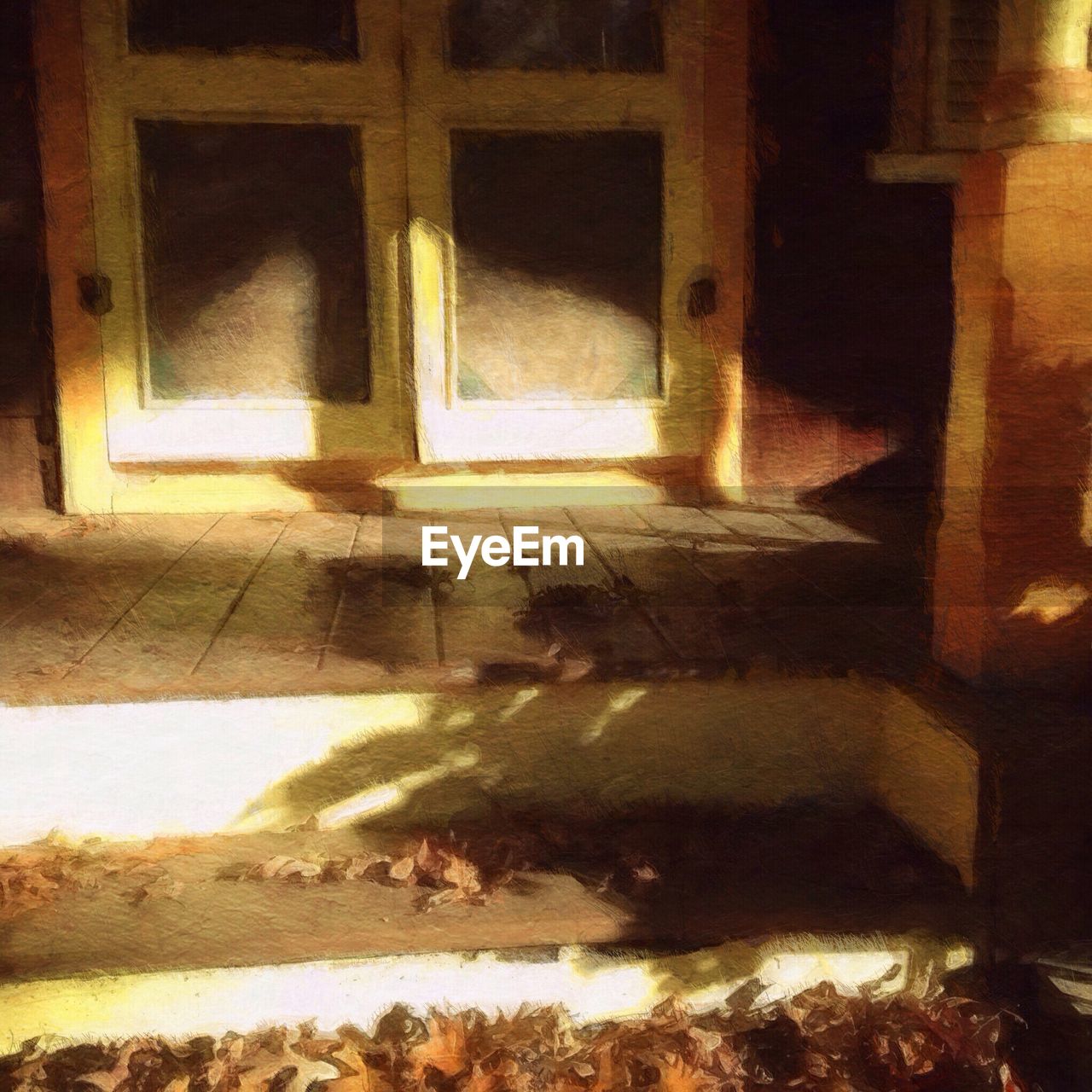 Fallen leaves on steps at entrance