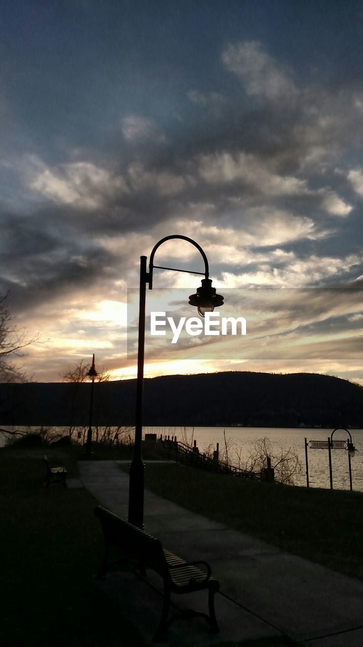 VIEW OF CLOUDY SKY AT SUNSET