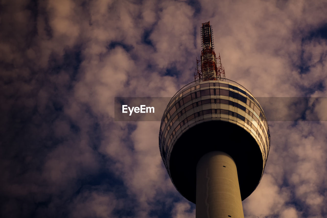 LOW ANGLE VIEW OF COMMUNICATIONS TOWER AGAINST SKY