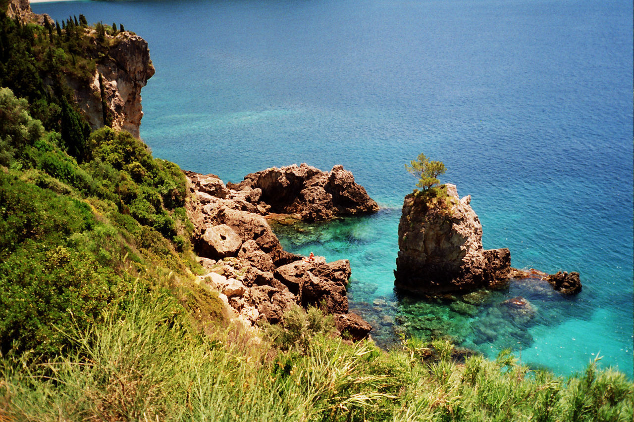 High angle view of rocks in sea