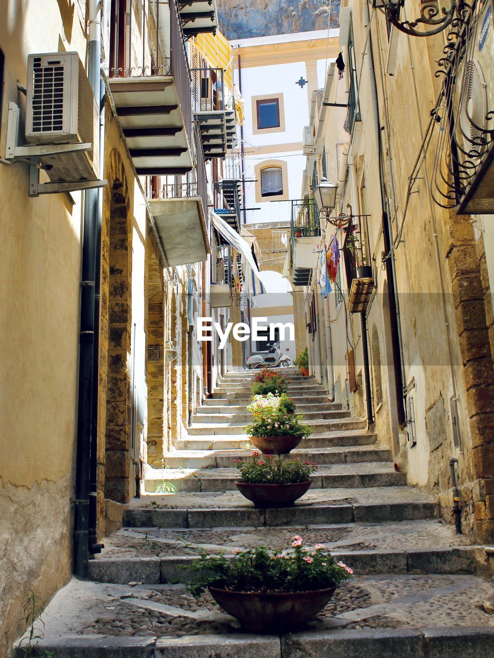 Narrow alley amidst houses