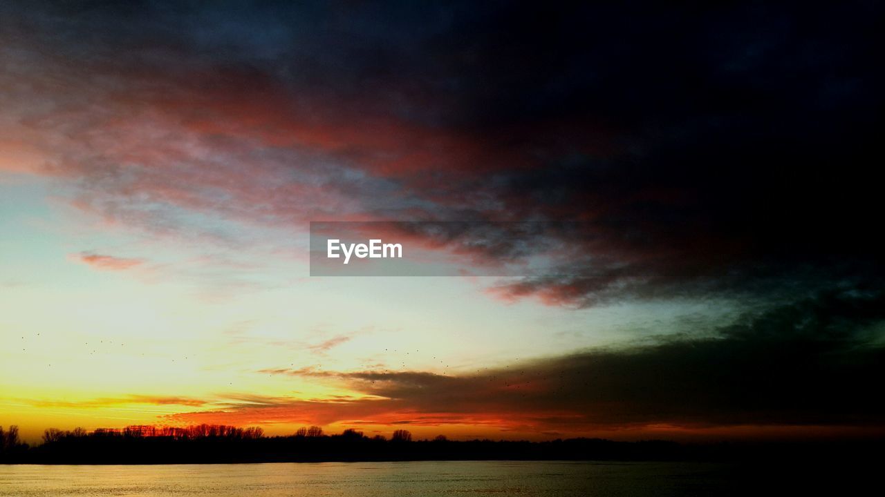 SCENIC VIEW OF DRAMATIC SKY OVER LAND