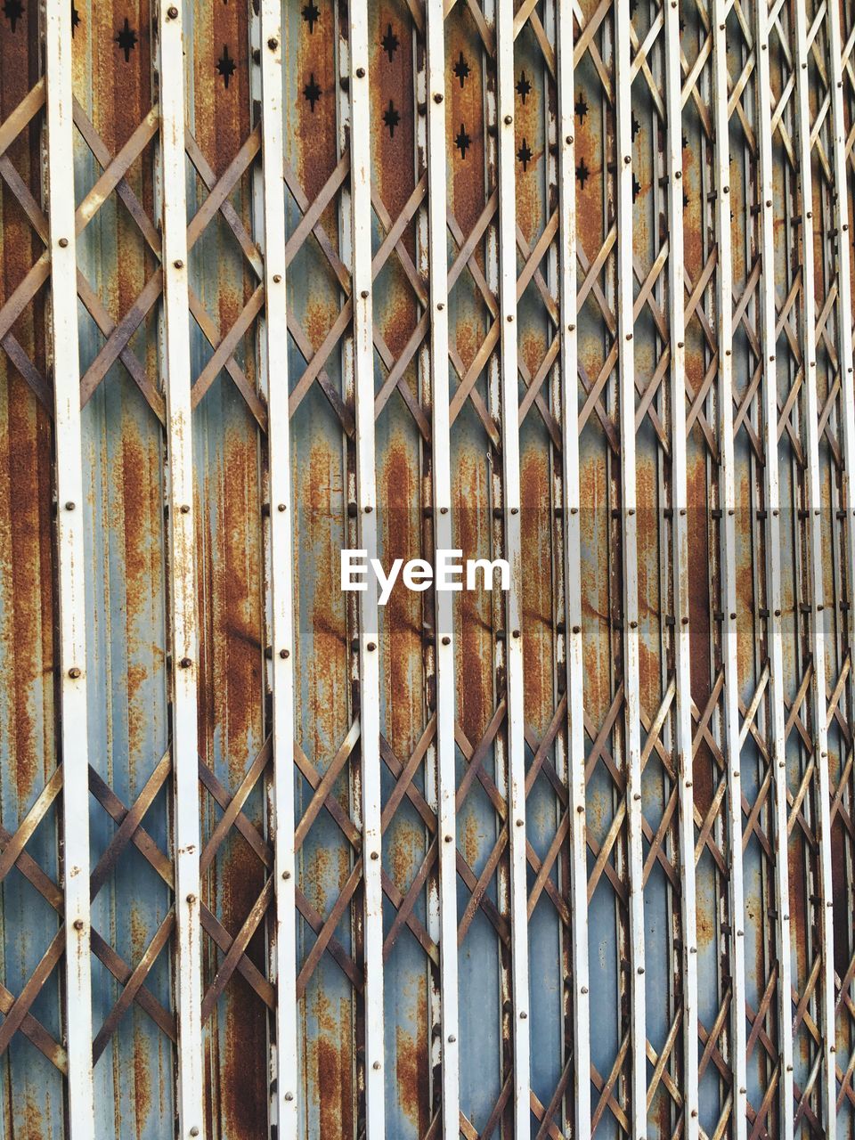 Full frame shot of rusty metal gate