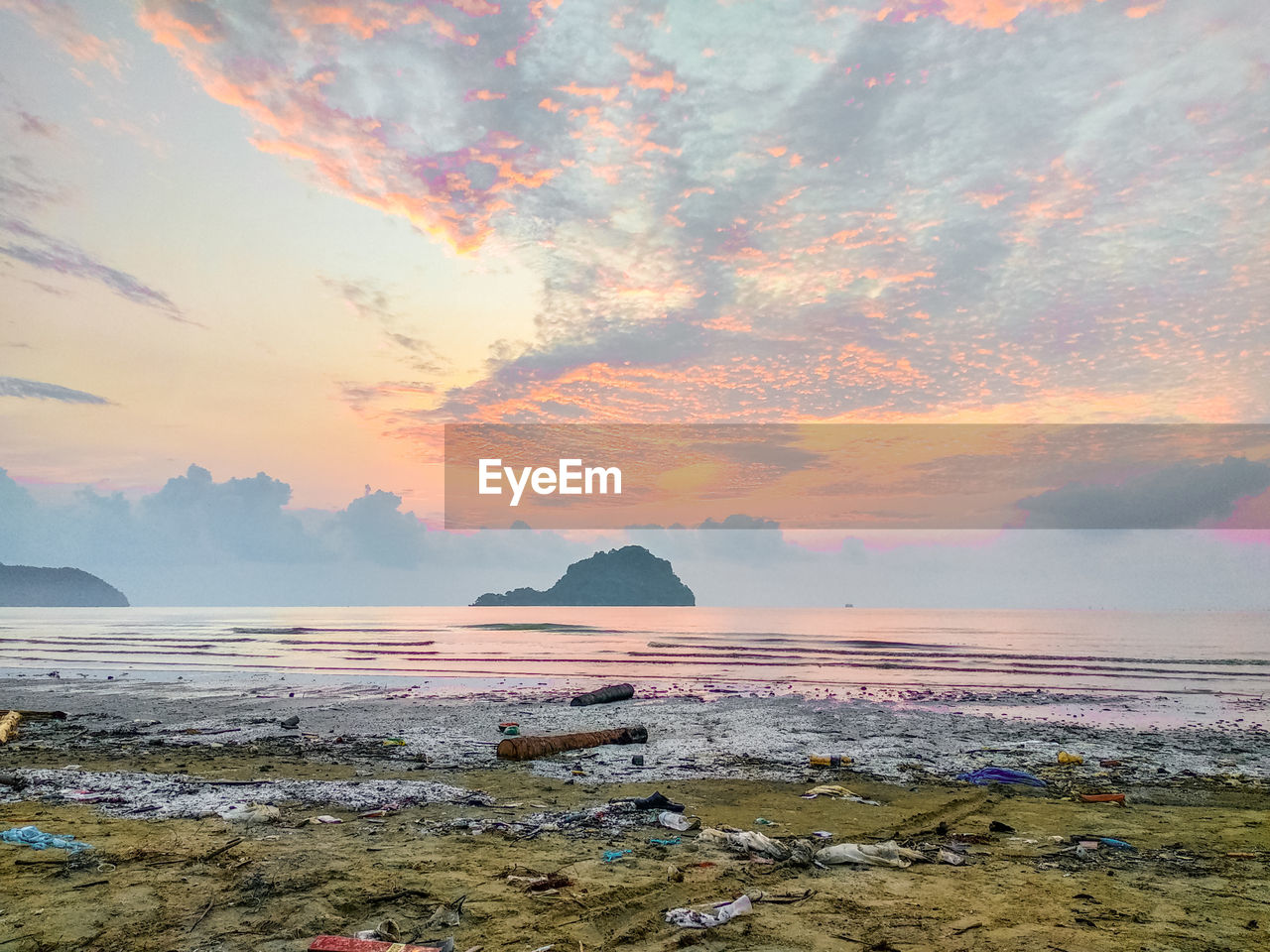 SCENIC VIEW OF SEA DURING SUNSET