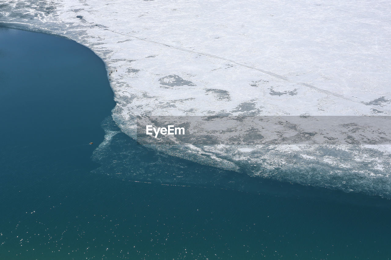 CLOSE-UP OF RIPPLED SEA