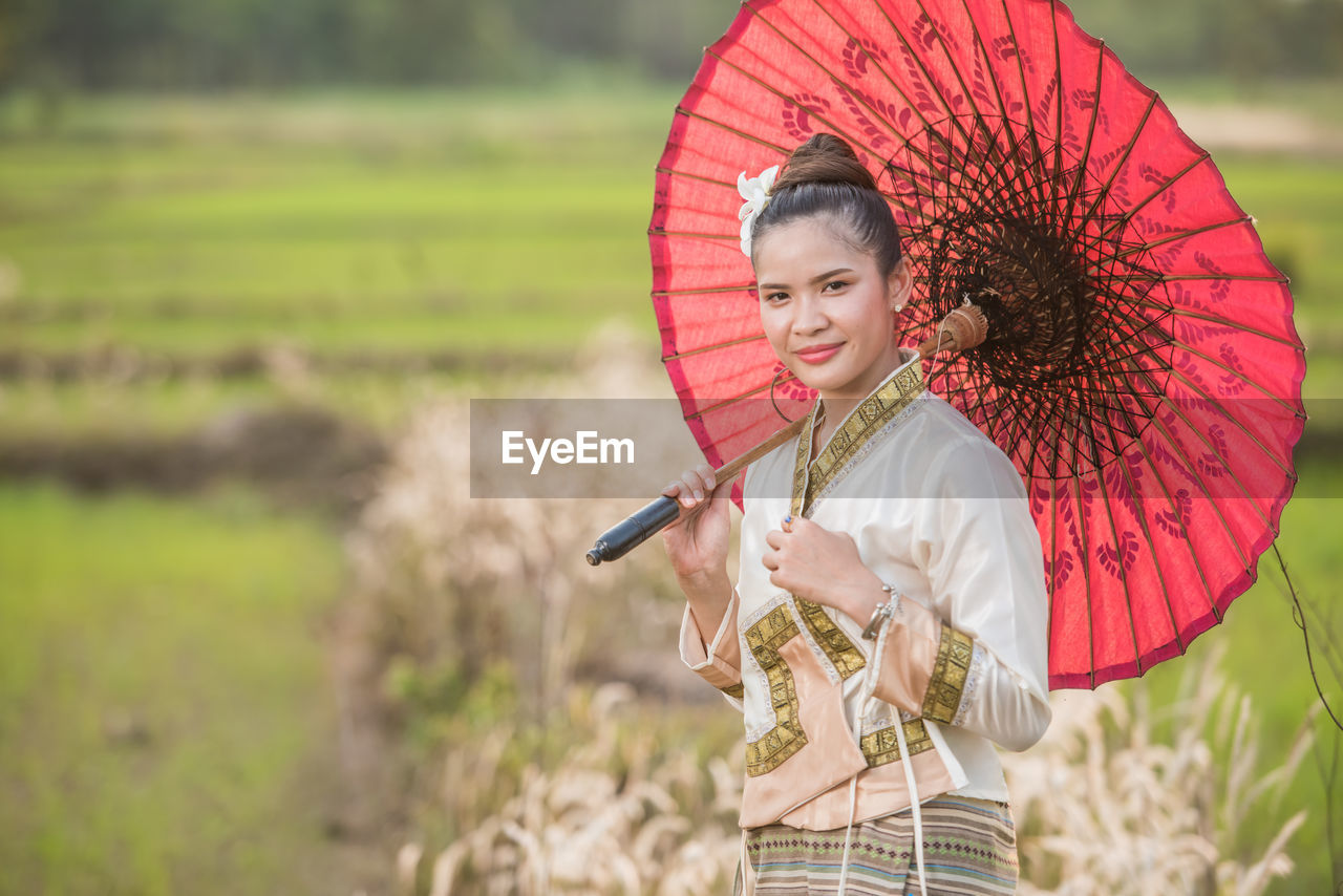 Woman holding umbrella