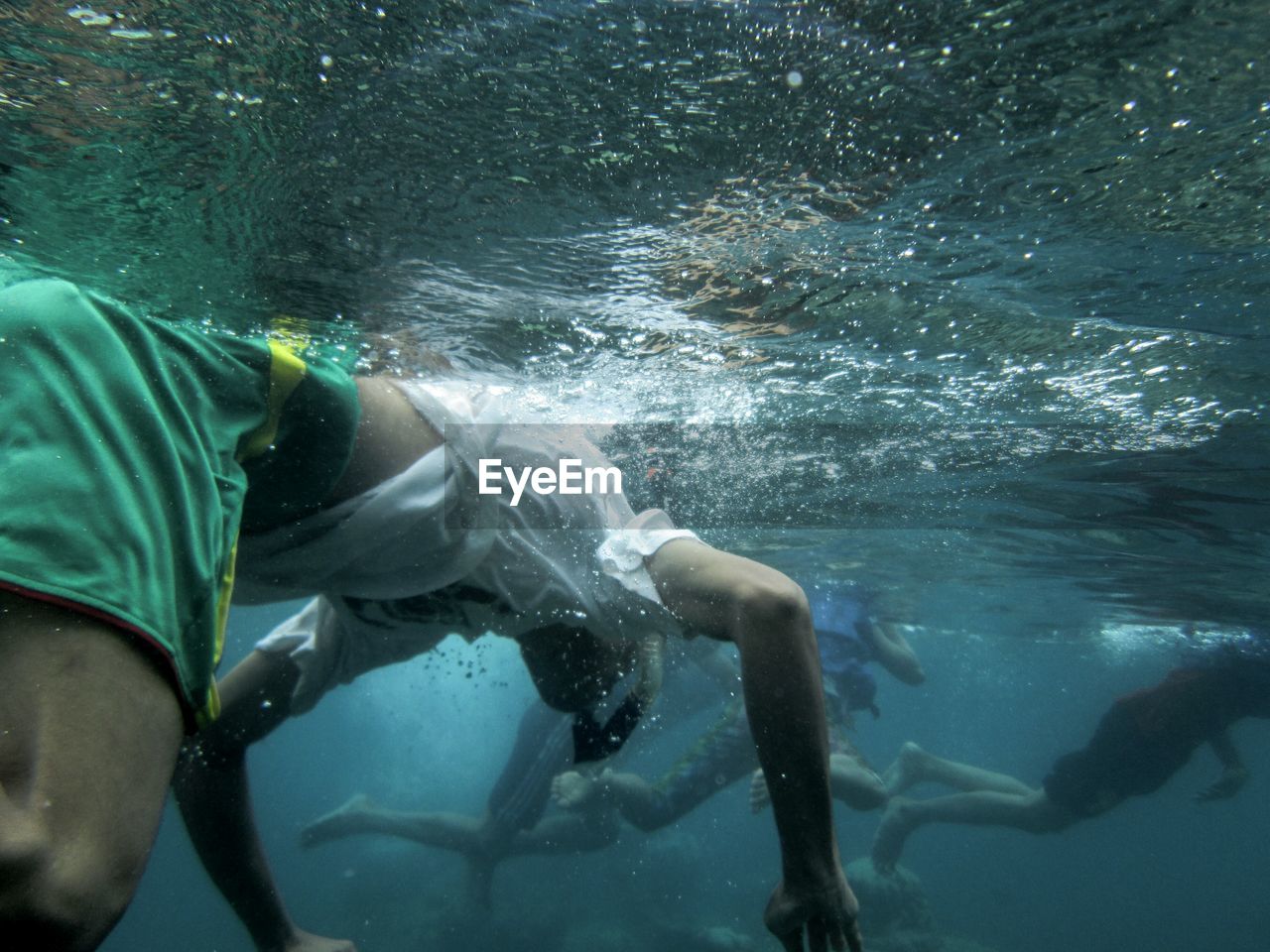 Men snorkeling in sea