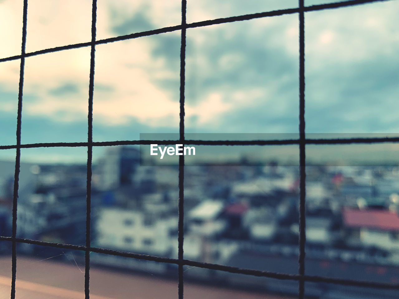 BUILDINGS SEEN THROUGH WINDOW