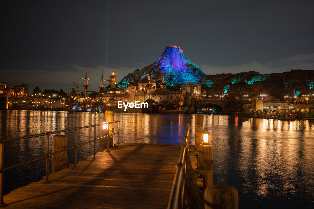 Illuminated buildings at waterfront