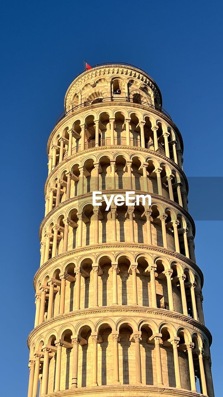 low angle view of historical building against clear blue sky