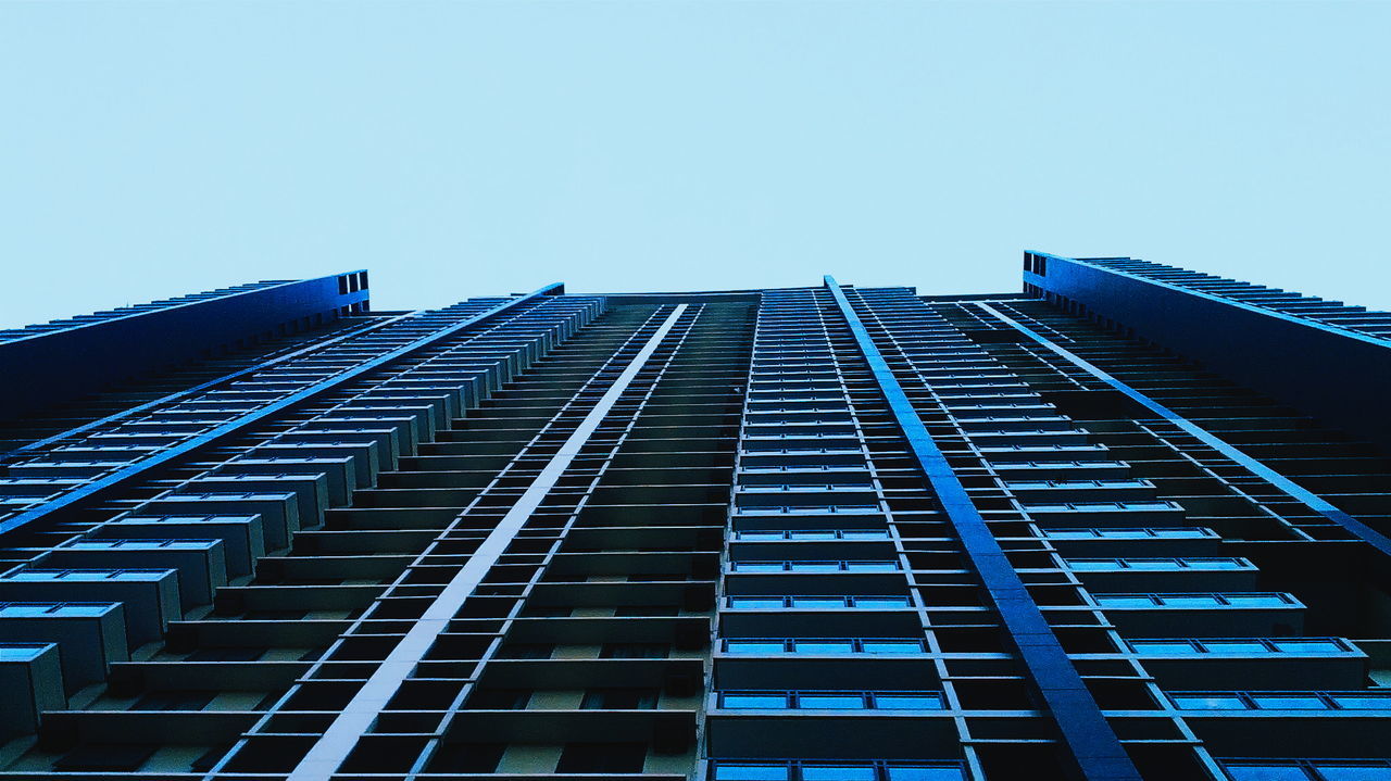 Low angle view of residential building against clear sky