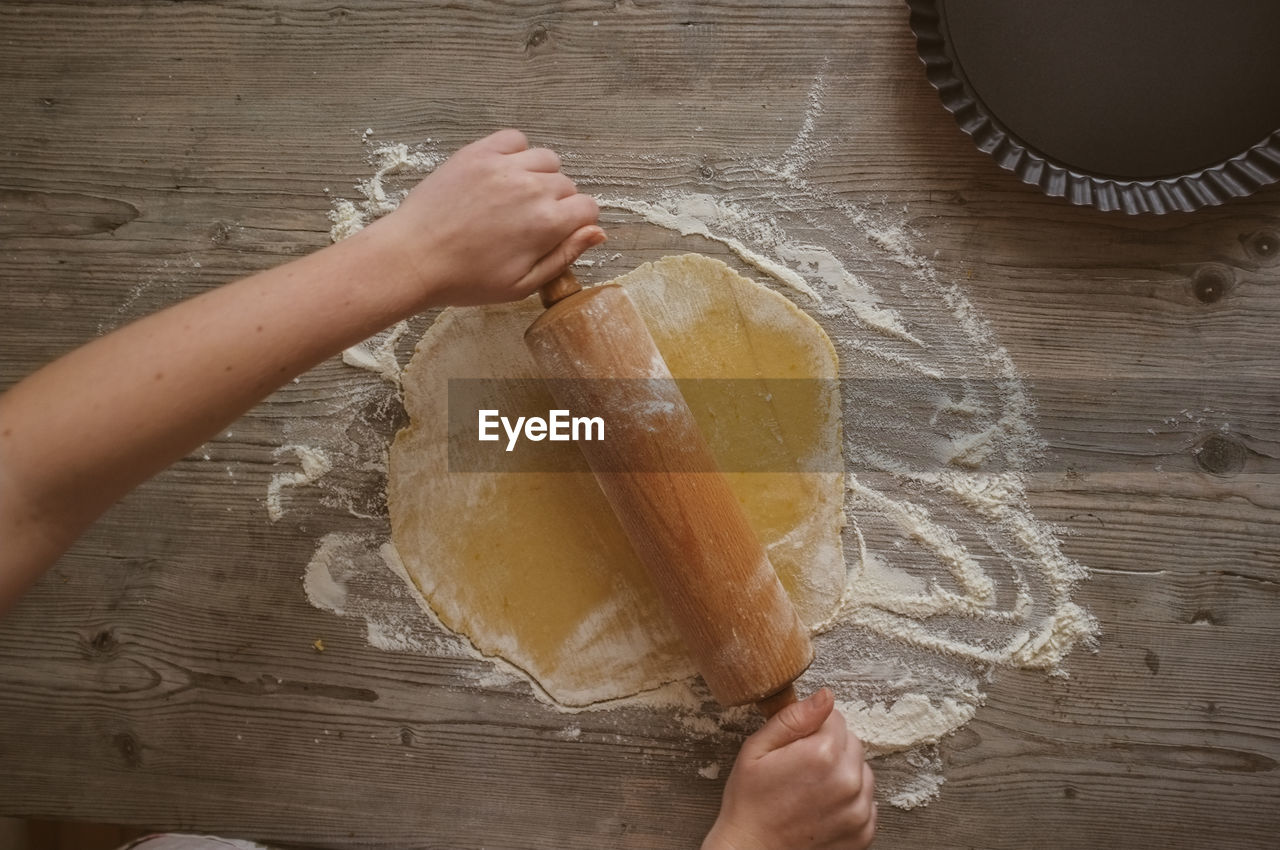 High angle view of woman making pastry