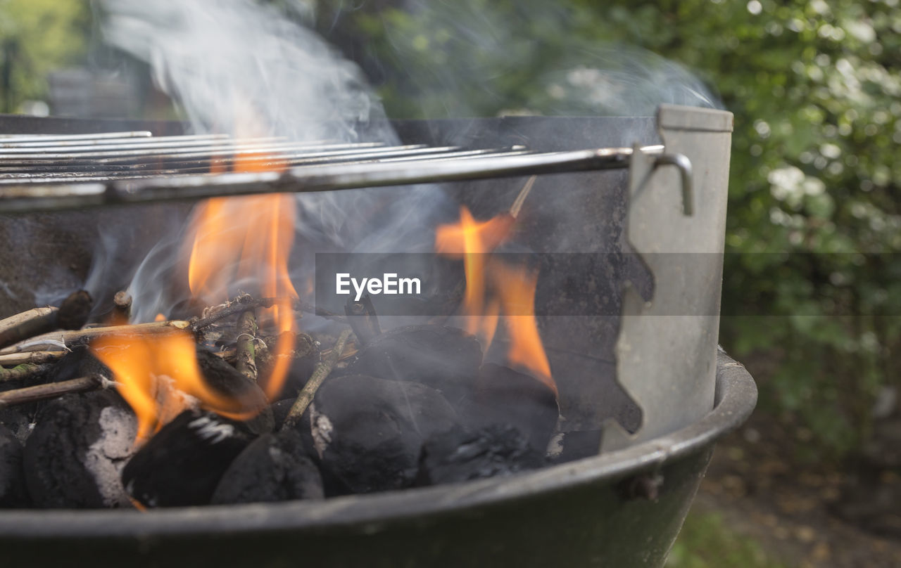 Preparing the barbecue for moms birthday celebration