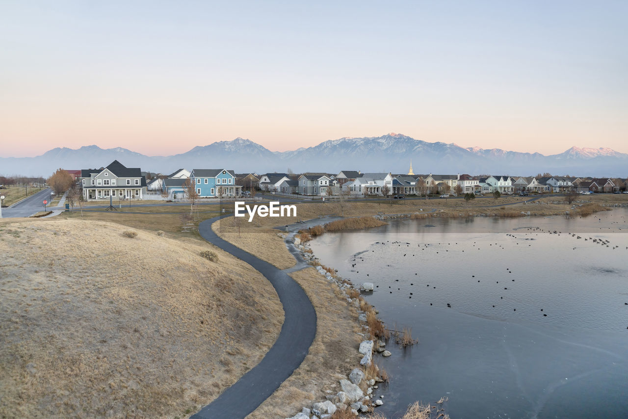 SCENIC VIEW OF LAKE AGAINST CLEAR SKY