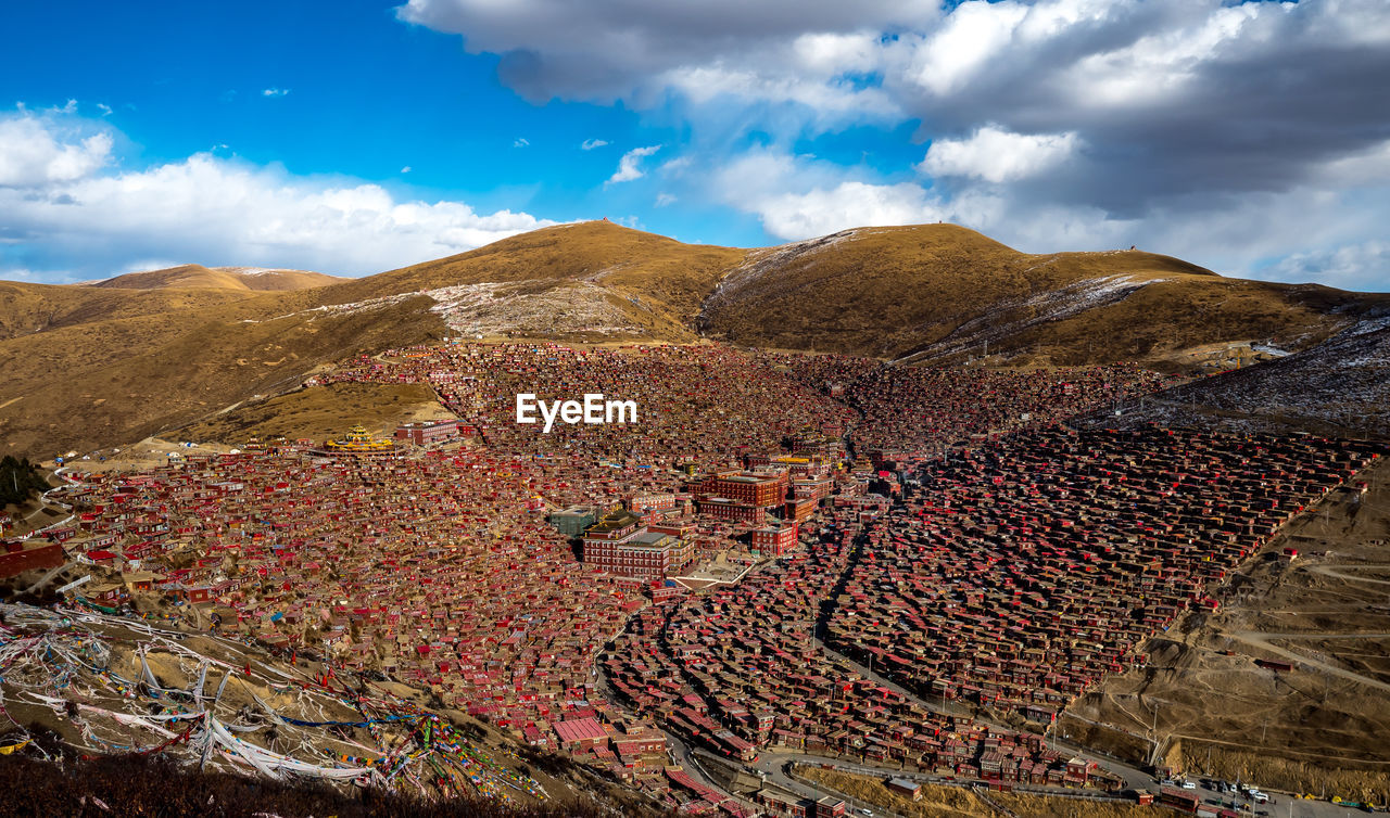 HIGH ANGLE VIEW OF LAND AGAINST SKY