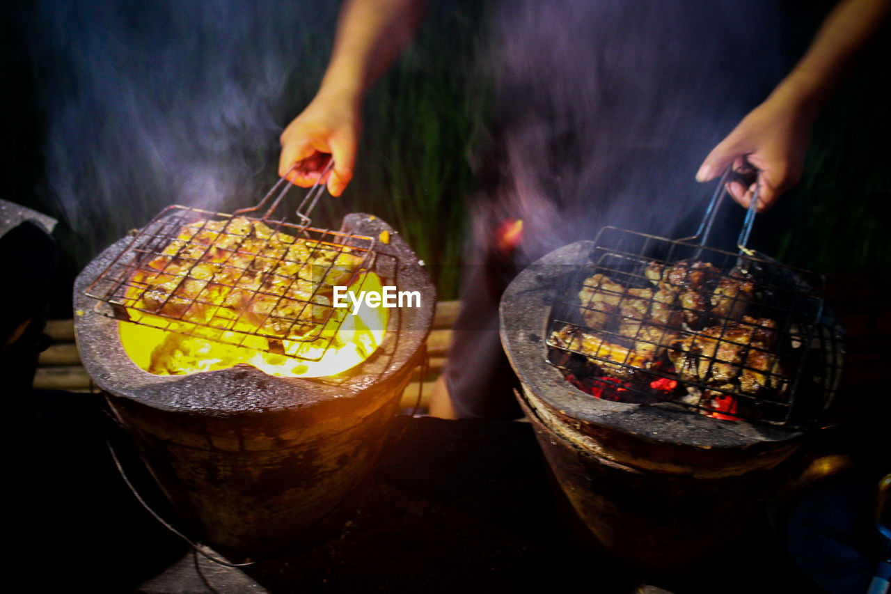 Midsection of person preparing food