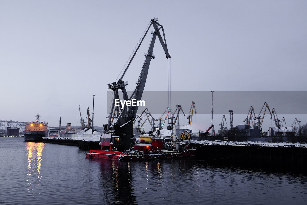 SHIP AT HARBOR AGAINST CLEAR SKY