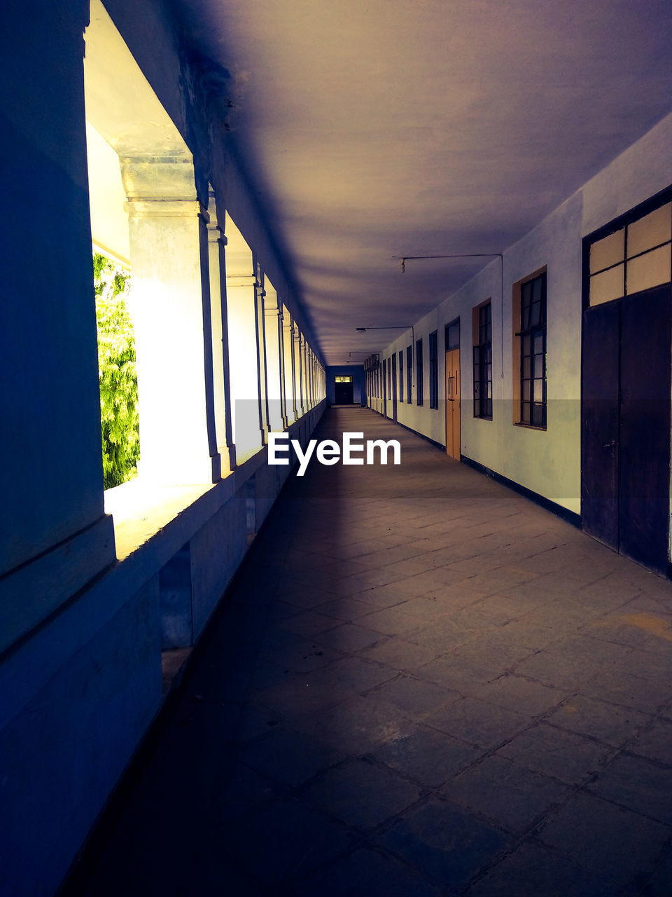 EMPTY CORRIDOR WITH BUILDING