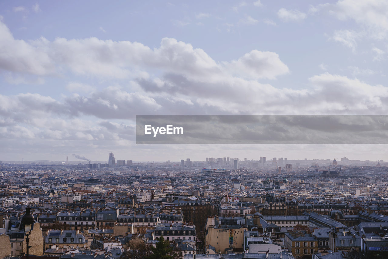 High angle view of paris townscape against sky from montmartre